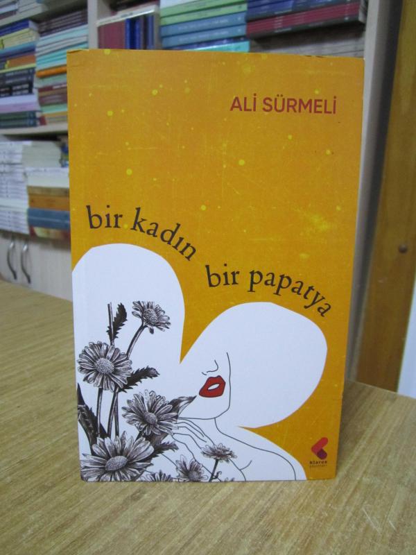 Bir Kadın Bir Papatya - Ali Sürmeli