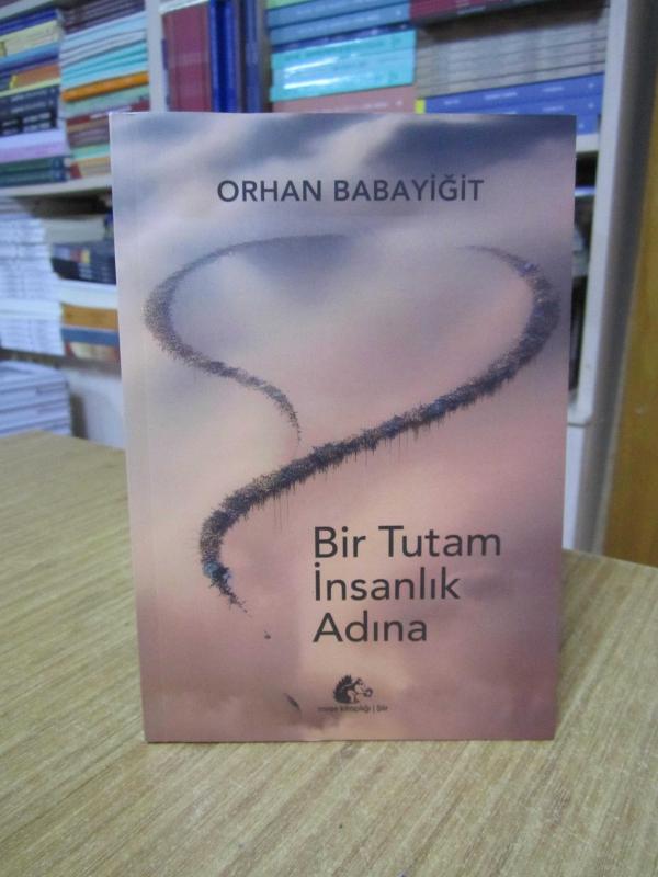 Bir Tutam İnsanlık Adına - Orhan Babayiğit