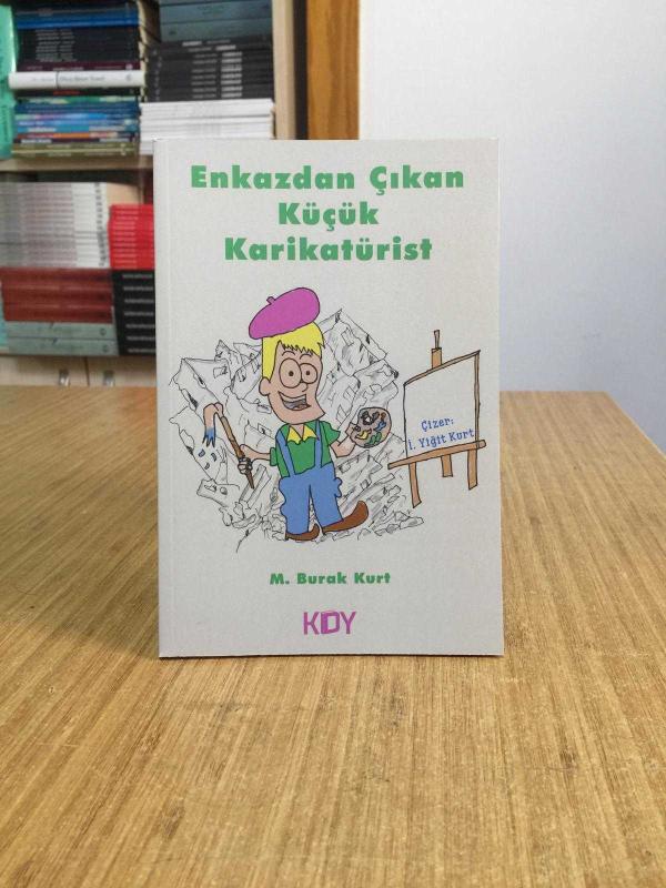 Enkazdan Çıkan Küçük Karikatürist - M. Burak Kurt