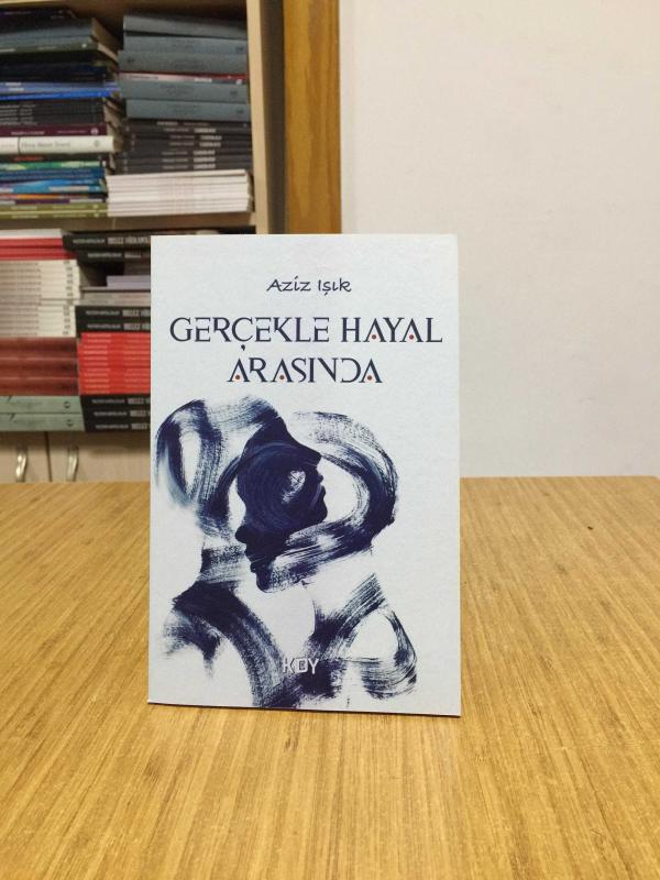 Gerçekle Hayal Arasında - Aziz Işık