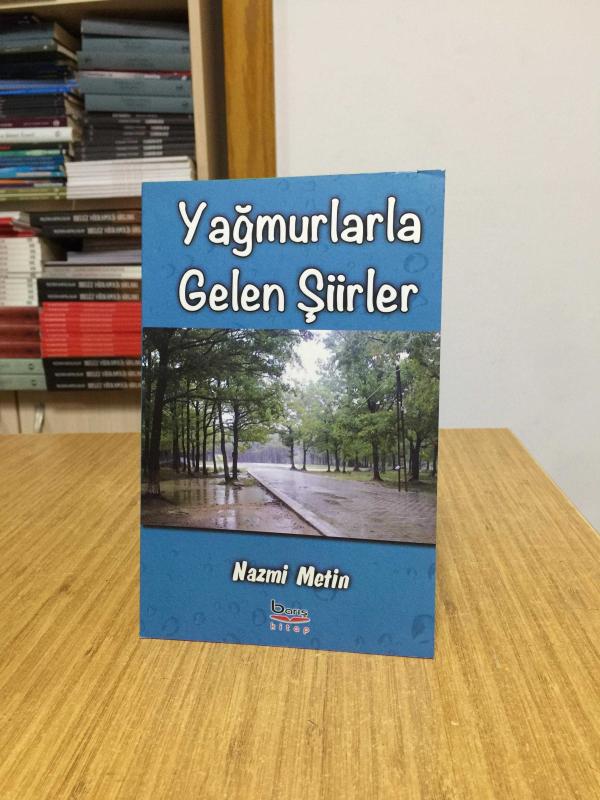Yağmurlarla Gelen Şiirler - Nazmi Metin